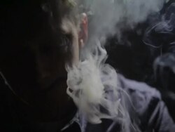 Close up of a man smoking cigar (Slow Mo) Stock Footage