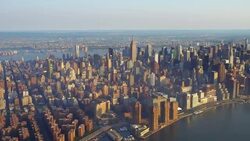 WS AERIAL POV View of modern skyscrapers in downtown with Empire State Building / Midtown Manhattan, New York City, New York State, United States Stock Footage
