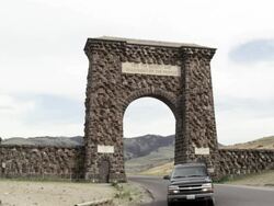 Roosevelt Arch, Entrance to the North Gate of Yellow Park, Yellowstone NP, United States Stock Footage