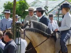 MS CU Group of female riders in traditional dress stopping for drink  during 'Feria festival  / Seville, Andalusia, Spain Stock Footage