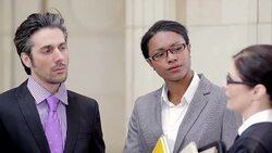 Judge and lawyers talking at courthouse Stock Footage