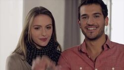 Couple posing with key in new apartment Stock Footage