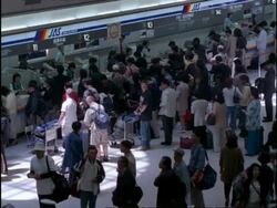 Golden week holiday crowds, queues at check in desk, Tokyo International Airport, Haneda, Japan Stock Footage