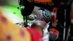 Female tailor working on sewing machine Stock Footage