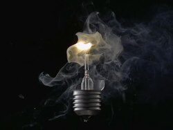 CU SLO MO Shot of exploding light bulb with smoke coming out / Munich, Bavaria, Germany Stock Footage