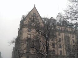 MS TD View of Dakota at Central Park West during snow / New York City, New York, USA Stock Footage