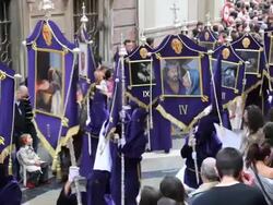 Nazarenos in a procession during Holy Week, Semana Santa, April 2011, Malaga, Spain, Europe Stock Footage