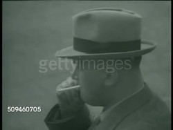 1938: CZECHOSLOVAKIA: Statue of US President Woodrow Wilson in park setting. Czechoslovakia President Benes smoking cigarette. Words on wall;' ...World Must be made Safe for Democracy.' Instructional Video