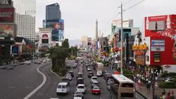 Tourists, neon signs, and casinos characterize The Strip in Las Vegas. Stock Footage