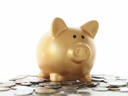 WS Shot of gold piggy bank and coins  / Shibuya, Tokya, Japan Stock Footage