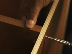HD: Screwing two pieces of wood together Stock Footage