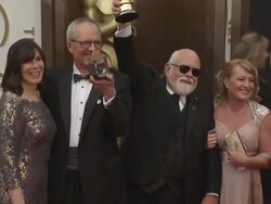 Peter W. Anderson & Charles "Tad" Marburg - 86th Annual Academy Awards - Arrivals Stock Footage
