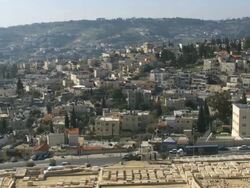 WS PAN View of east Jerusalem and Arab villages Ras alamud, Siluan, Abu tor / Jerusalem, Judea, Israel Stock Footage