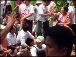 WRAP Protesters demand junta release Suu Kyi, barricades near her home Instructional Video