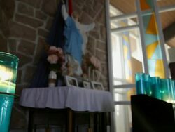 Lampions lit in a church Stock Footage