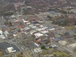 WS AERIAL ZI View of townscape with buildings ad street / North Carolina, United States Stock Footage