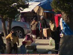 Bustling market in Cala Cala, Bolivia during spring festival Stock Footage