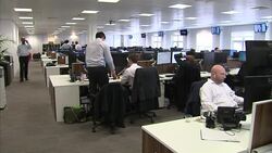 Traders Working in Monex Europe Offices News Clip