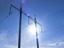 Electricity pylon and the Sun Stock Footage