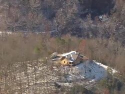MS AERIAL Shot of houses surrounded by trees in Nantahala National Forest / North Carolina, United States Stock Footage