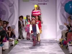 Heidi Klum and models walk during Heidi Klum Presents Her Holiday Truly Scrumptious Collection For Babies"R"Us At Kids Fashion Week In NYC  Stock Footage
