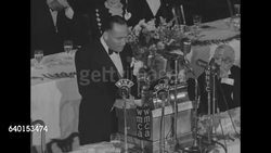 Film producer Hal Wallis addresses a banquet commemorating the 50th anniversary of Alfred Nobels death News Clip