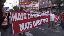 CLEAN : Tens of thousands march for Brazil's embattled left News Clip