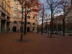 Dolly shot in front of the old post office pavilion on Pennsylvania Avenue in Washington DC Stock Footage