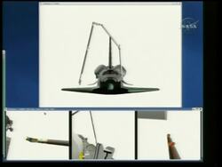 Crew examines shuttle for damage News Clip