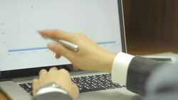 HD : Businessman is analyzing business data Stock Footage