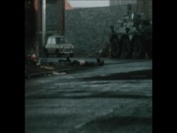 SYND 25-11-73 BODY OF MURDER YOUNG MAN FOUND IN THE MARKET AREA OF BELFAST News Clip