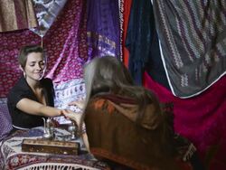 Gypsy Reads Palm of Young Woman Stock Footage