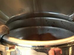 Getting coffee from the grinder Stock Footage