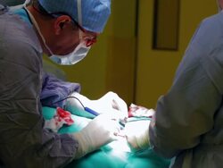 surgeons performing surgery Stock Footage