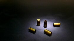 bullet shells with smoke Stock Footage