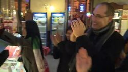 VOICED: Celbrations after Berlusconi resigns News Clip