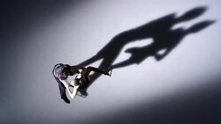 SLO MO Skating pair performing a spin pose Stock Footage