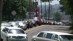 After a funeral that saw more than 4,500 mourners attend, a large funeral procession escorted Michael Brown's body to a St. Louis cemetery. (Aug. 26) News Clip