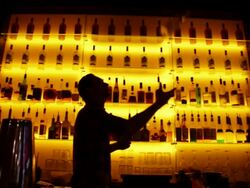Barman making cocktail in bar in Belgium Stock Footage