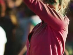 young woman dancing and jumping up and down at a Hindu festival Stock Footage