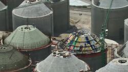Aerial view of men working on the holding tanks in a water treatment plant in Tepoztlan, Mexico. Stock Footage