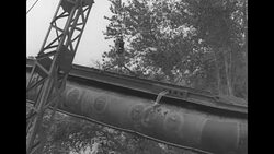 American military builds pontoon bridge over Volturno River during World War II News Clip