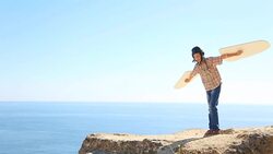 Boy learns to fly with wings Stock Footage