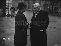 1947: PARIS, FRANCE: WS Palais de l'Elysee (Presidential Palace). Unidentified male talking w/ Premier Paul Ramadier outside. President of Provisional Government Vincent Auriol at desk, CU Male hand signing papers, handing paper to man in uniform. Instructional Video