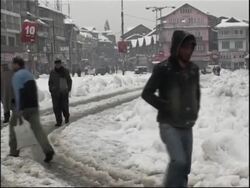 Heavy snowfall cuts land and rail links News Clip
