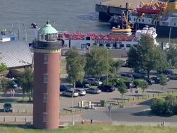 AERIAL MS View of lighthouse / Cuxhaven, Schleswig-Holstein, Germany Stock Footage