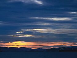 timelapse-Loading cargo ships during sunrise.(zoom out) Stock Footage