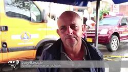 VOICED : Vecinos de colombiana Guatape homenajean a victimas de naufragio News Clip