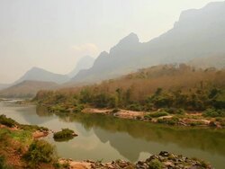 WS Shot of river with mountains / Road from Luang Prabang to Nong Khio, Luang Prabang, Laos Stock Footage