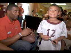 Former NFL Star Cris Carter Delivers Papa John's Pizza Stock Footage